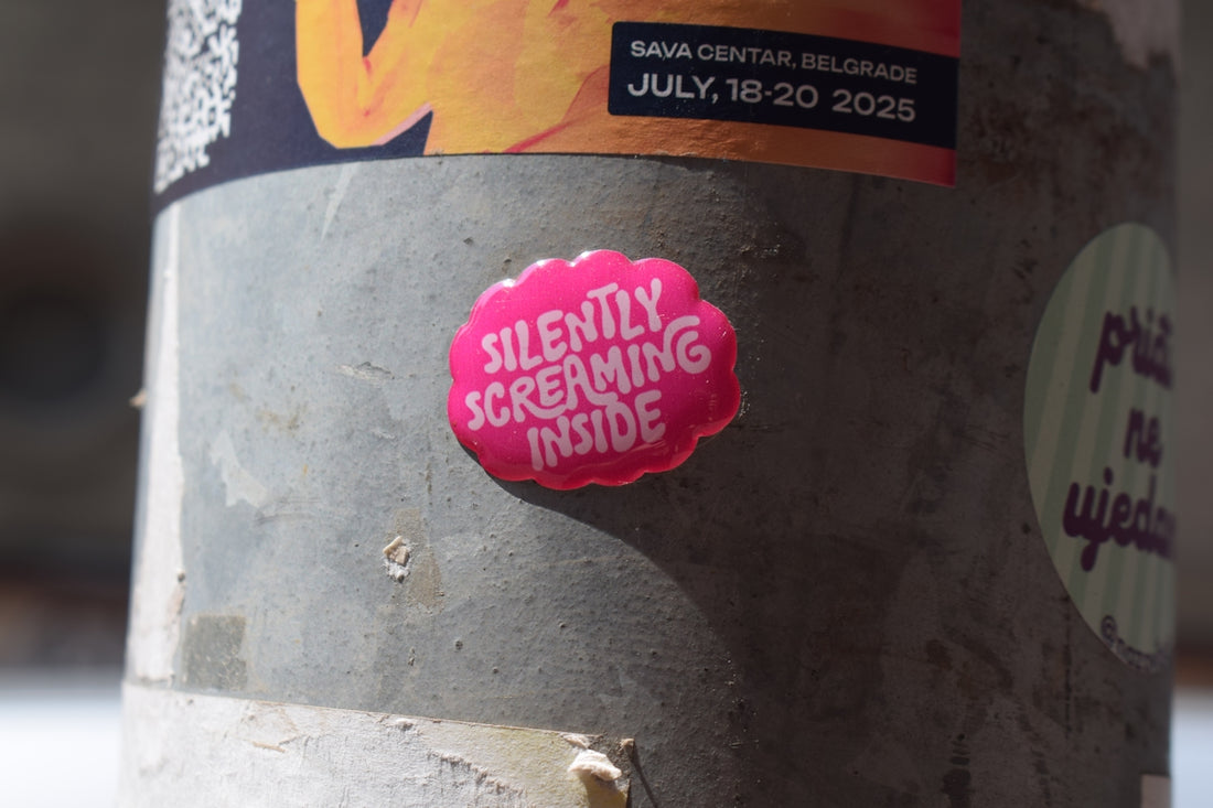 A sticker states silently screaming inside.