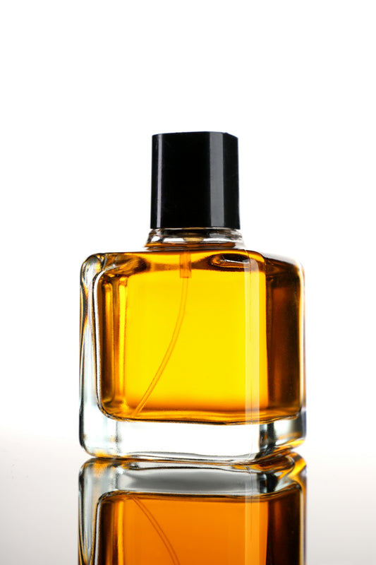 a bottle of perfume sitting on top of a table