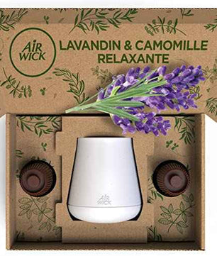 Contenu de la boîte Air Wick Essential Mist blanc avec 2 recharges Lavande et Camomille Relaxante, présenté dans un emballage décoré.