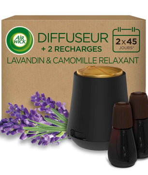 Diffuseur Air Wick Essential Mist noir avec 2 recharges parfum Lavande et Camomille Blanc, présenté devant un emballage éco avec brins de lavande.