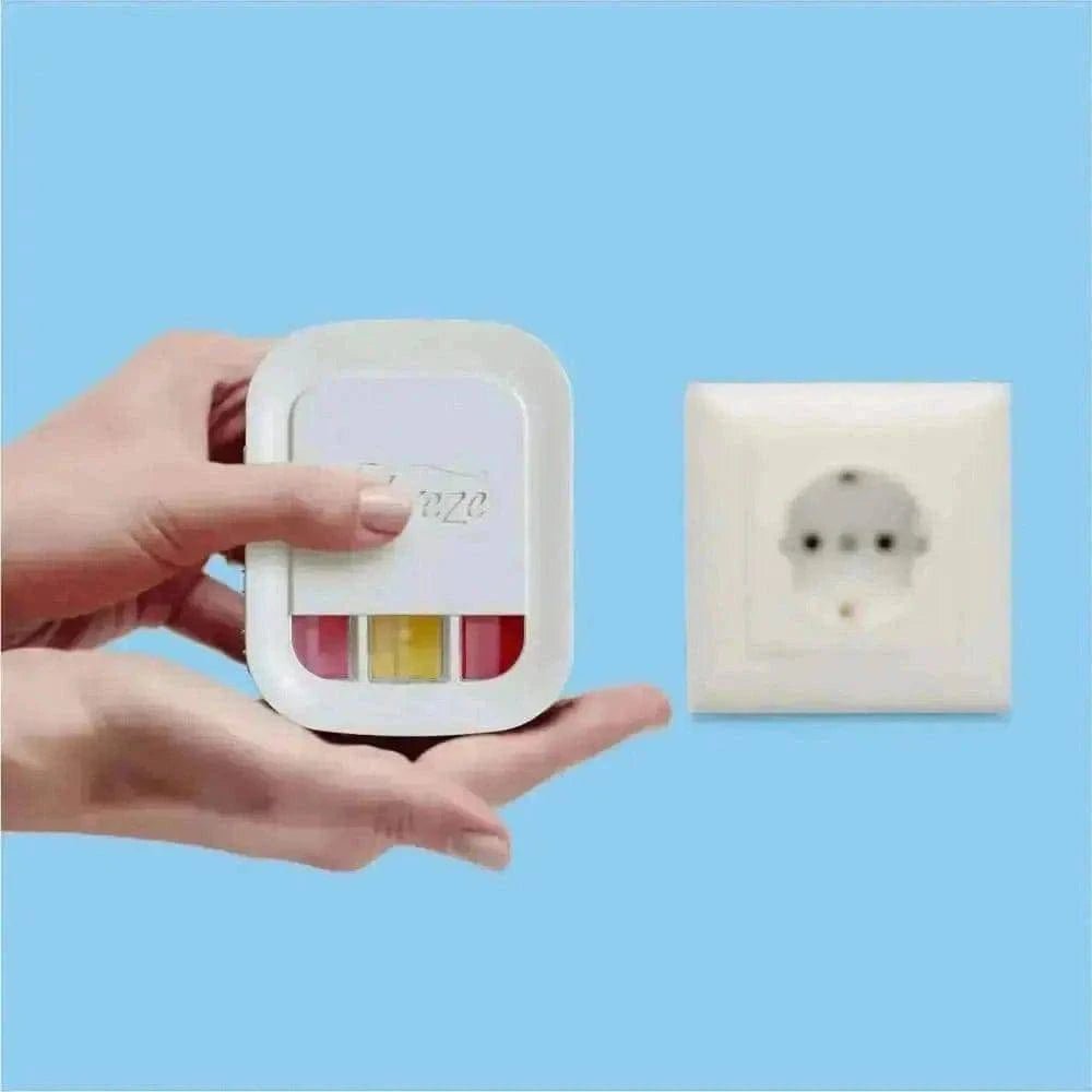 Main image of FEBREZE Electric Recharge, showing device in hand and power outlet, highlighting easy installation.