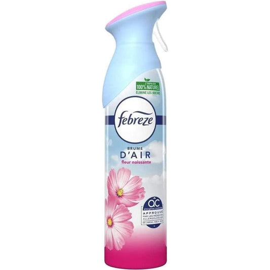 Spray désodorisant maison Febreze Fleur Naissante avec fleurs roses, conçu pour éliminer les odeurs et offrir une fraîcheur durable.